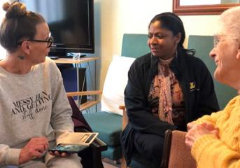 A Wolverhampton Homes team member talks to customers