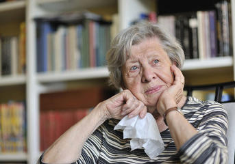 Elderly lady looking upset