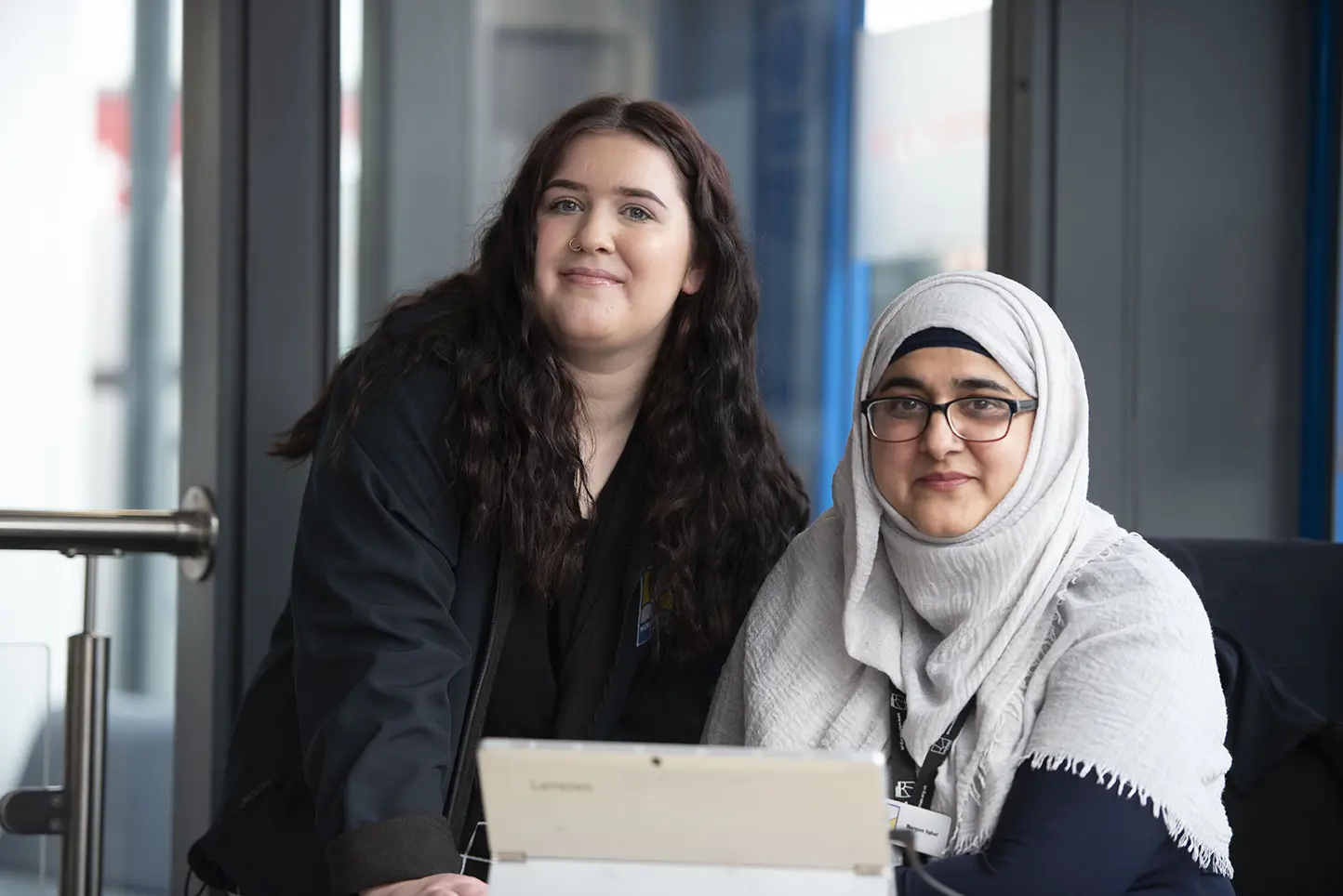 Two female Wolverhampton Homes team members smiling