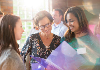 Three women, talking