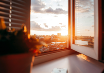 An open window with a view from a flat