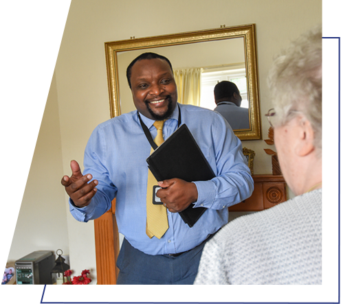 An image of a person holding a clipboard supporting a customer