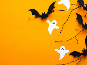 Halloween graphic with ghosts and bats