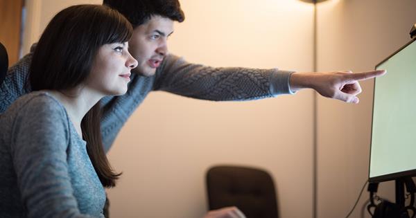 Man explaining something on screen