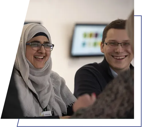 Two Wolverhampton Homes team members smiling