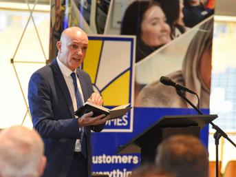 Shaun Aldis, Chief Executive of Wolverhampton Homes, speaks to a group of people