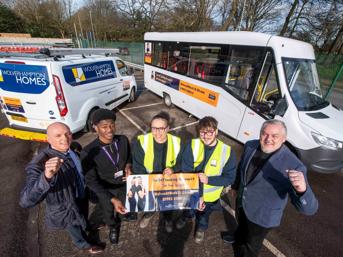 Wolves At Work launch by a Wolverhampton Homes van and a minibus  