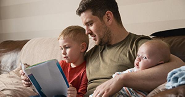 Dad With Kids On Sofa