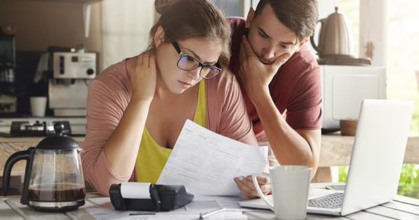 Couple looking at bills