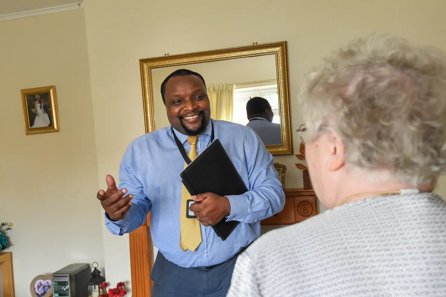 Man smiling in a home