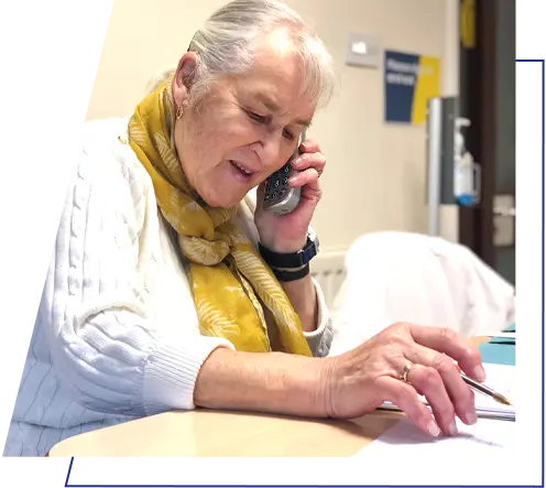 A customer speaks on the telephone