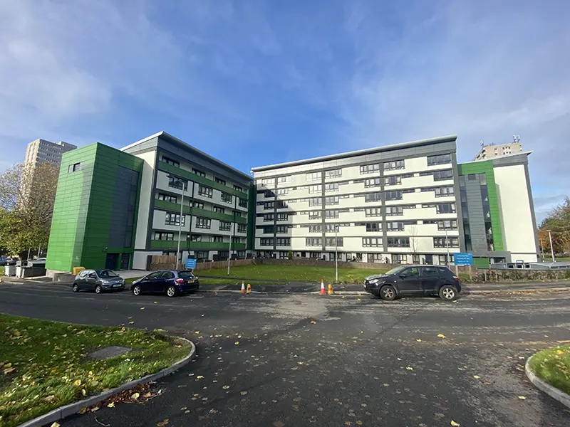 Heath Town block with green facade, newly refurbished