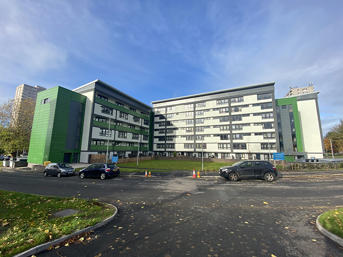 Heath Town block with green facade, newly refurbished