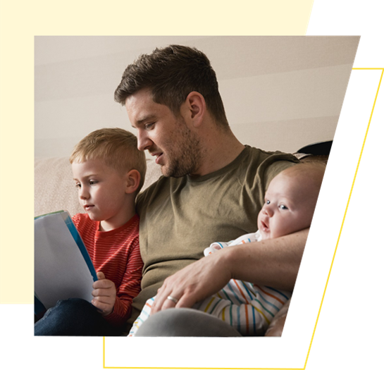 Dad With Kids On Sofa